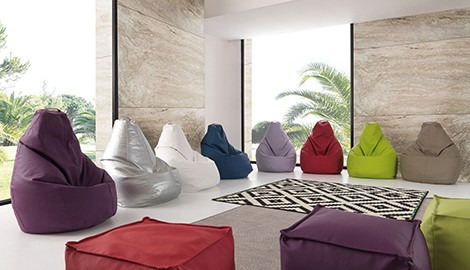 Large coloured poufs, comfortable bags for modern furnishing