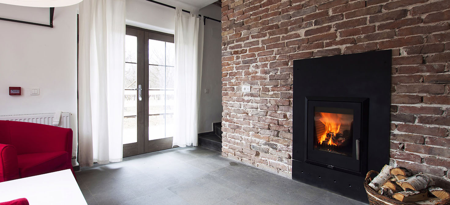 How to furnish a living room with a fireplace: the main styles