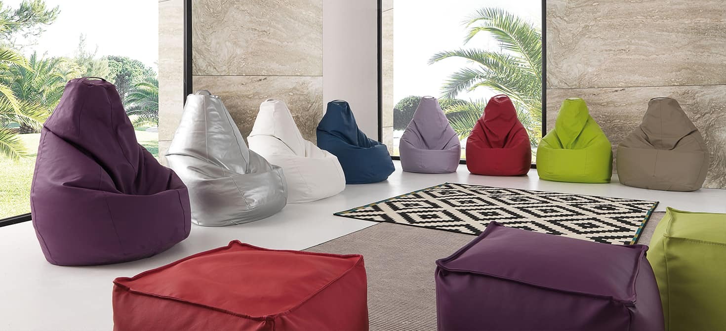 Large coloured poufs, comfortable bags for modern furnishing